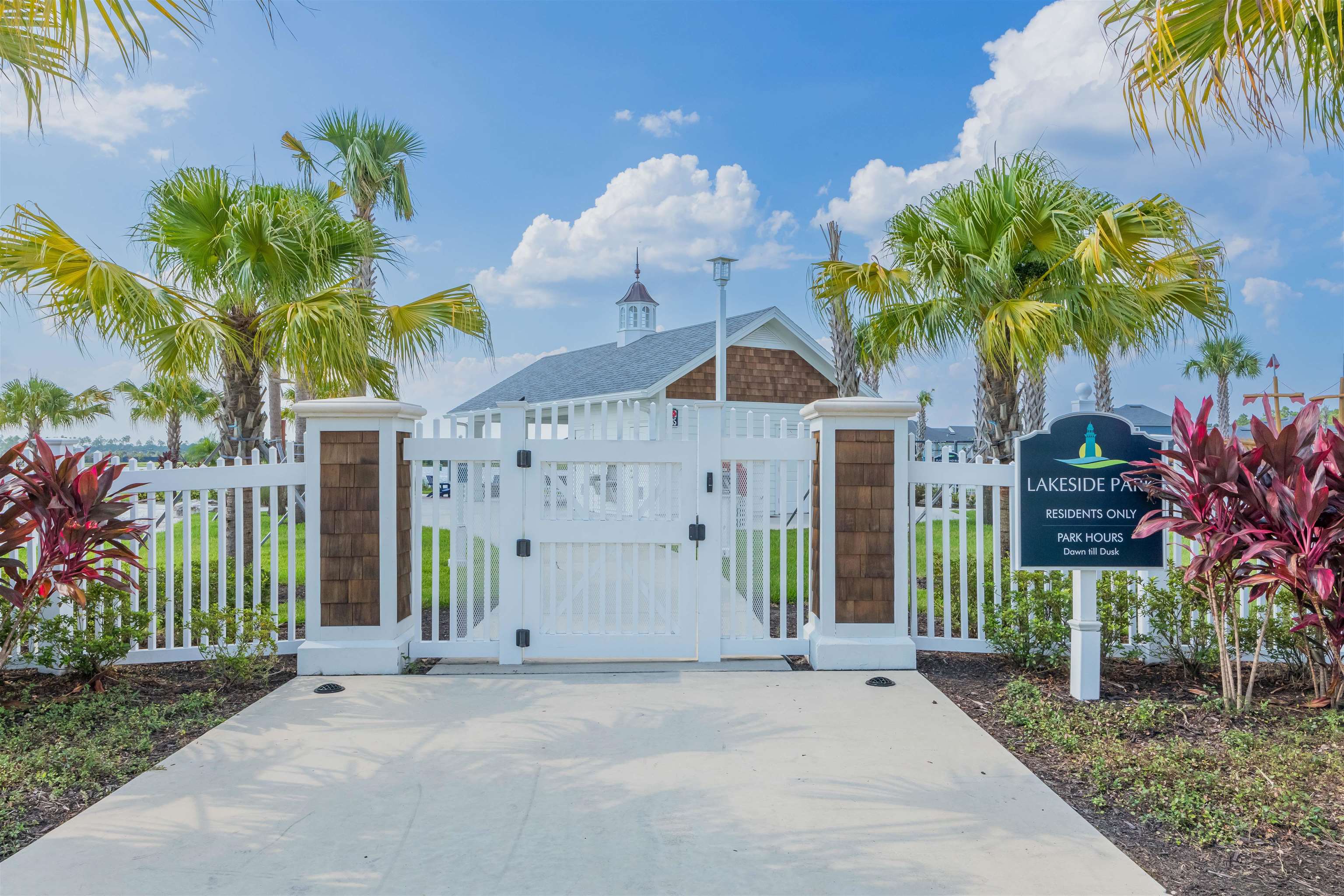 194 Snowbell Court St. Augustine, FL 32095 - Photo 61 of 75 a front view of a house with a garden