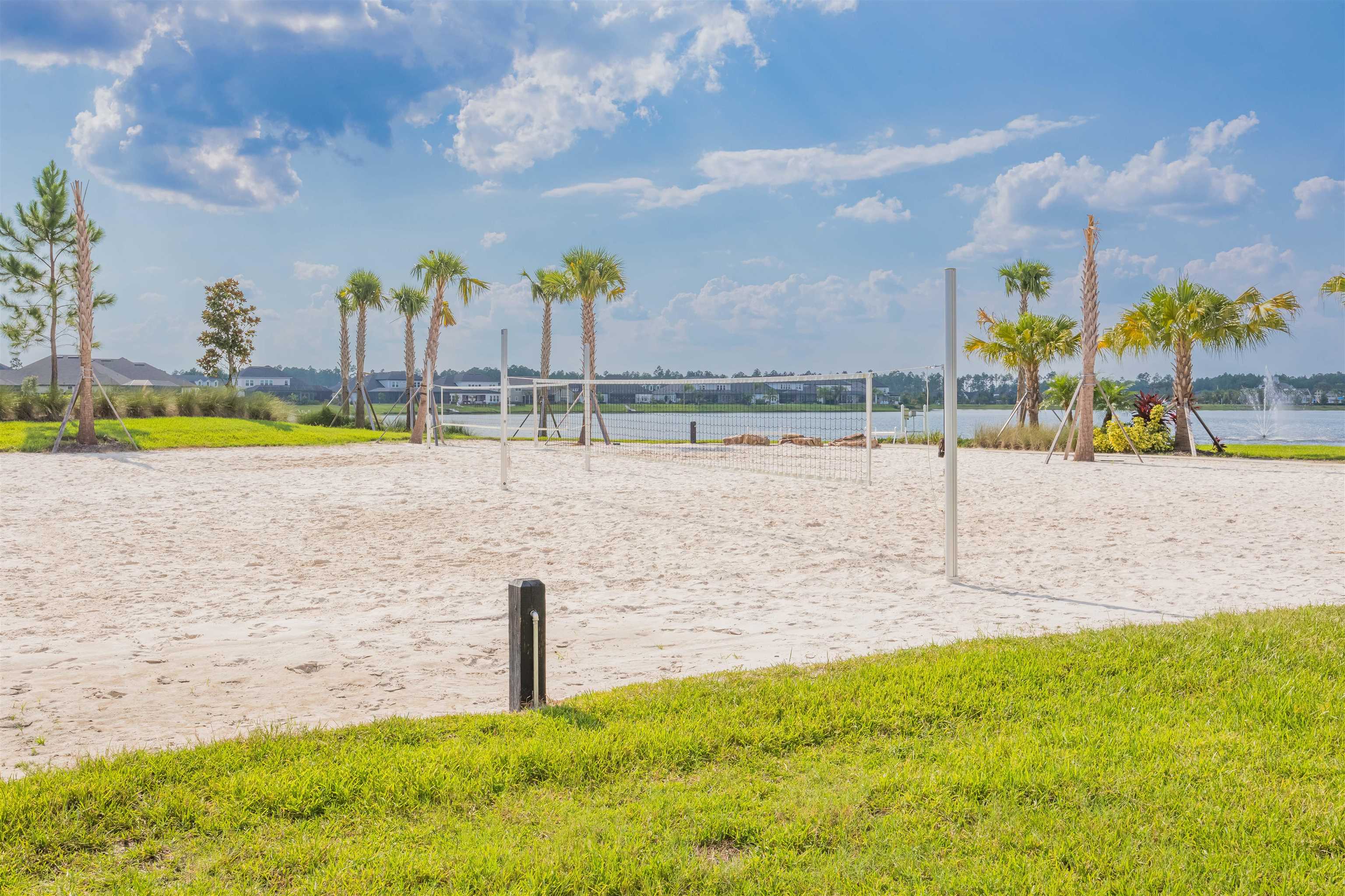 194 Snowbell Court St. Augustine, FL 32095 - Photo 69 of 75 a view of a lake with a yard