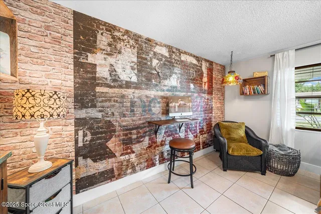 a outdoor living space with patio furniture and a potted plant