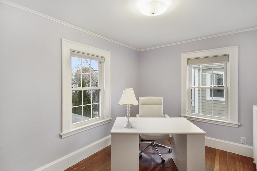 35 Standish Road Watertown, MA 02472 - Photo 15 of 33 a bedroom with a bed and a window