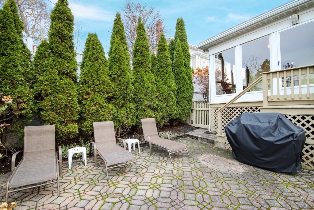 35 Standish Road Watertown, MA 02472 - Photo 31 of 33 a view of a patio with couple of chairs and a potted plant