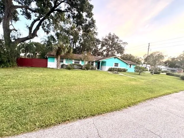 a house view with a garden space