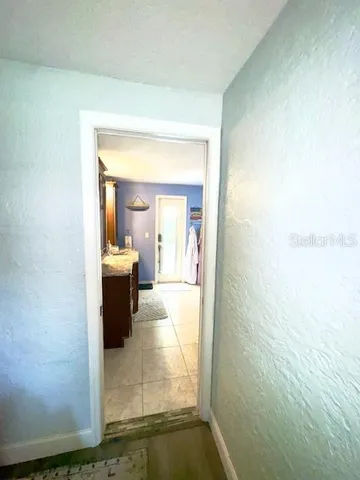 a bathroom with a sink and mirror