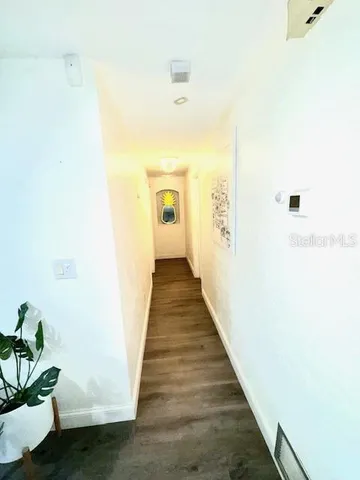 a bathroom with a sink a toilet and tub