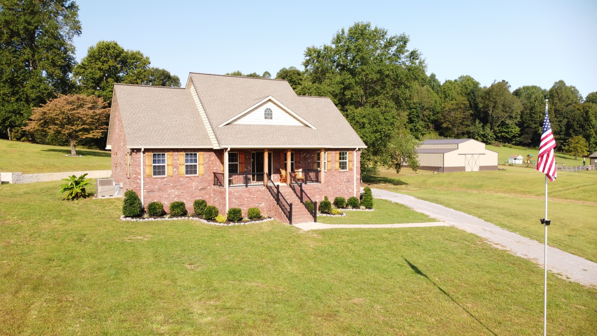 1701 Rock Bridge Road Bethpage, TN 37022 - Photo 1 of 29 a view of a house with pool and sitting area