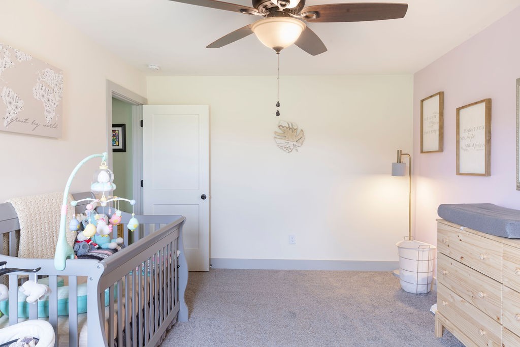 1701 Rock Bridge Road Bethpage, TN 37022 - Photo 14 of 29 a bedroom with furniture and a baby crib