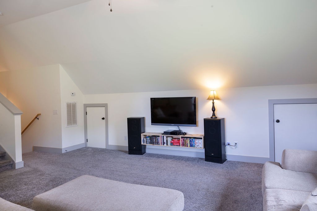 1701 Rock Bridge Road Bethpage, TN 37022 - Photo 22 of 29 a living room with furniture and a flat screen tv