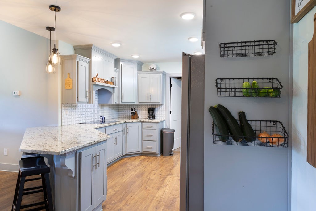 1701 Rock Bridge Road Bethpage, TN 37022 - Photo 6 of 29 a kitchen with a refrigerator and a sink