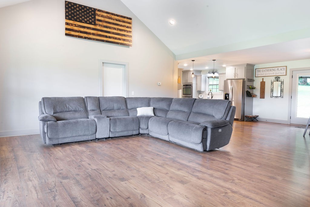 1701 Rock Bridge Road Bethpage, TN 37022 - Photo 7 of 29 a living room with furniture and a wooden floor