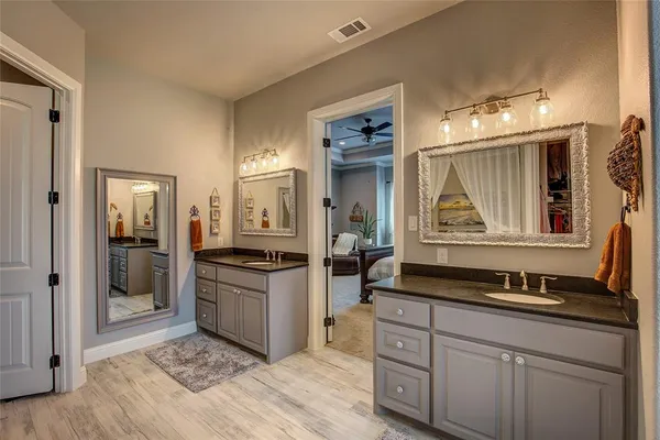 a kitchen with a stove and a refrigerator