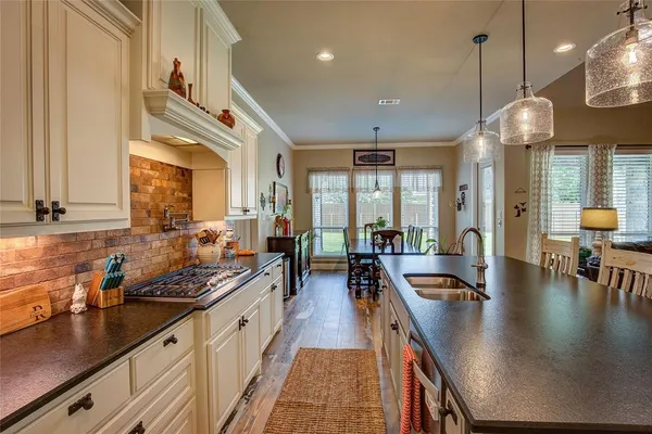 a kitchen with lots of counter space and a sink