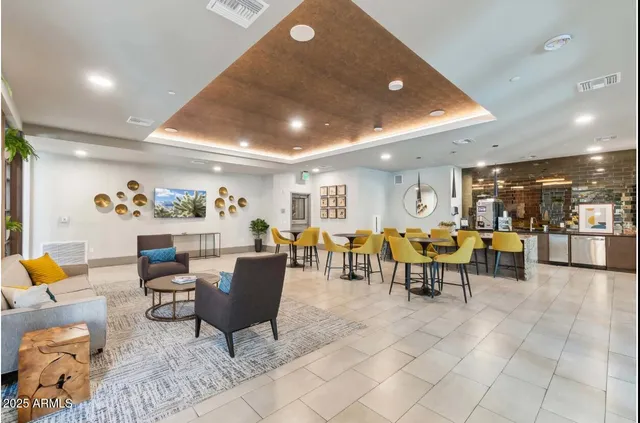 a living room with furniture and a table