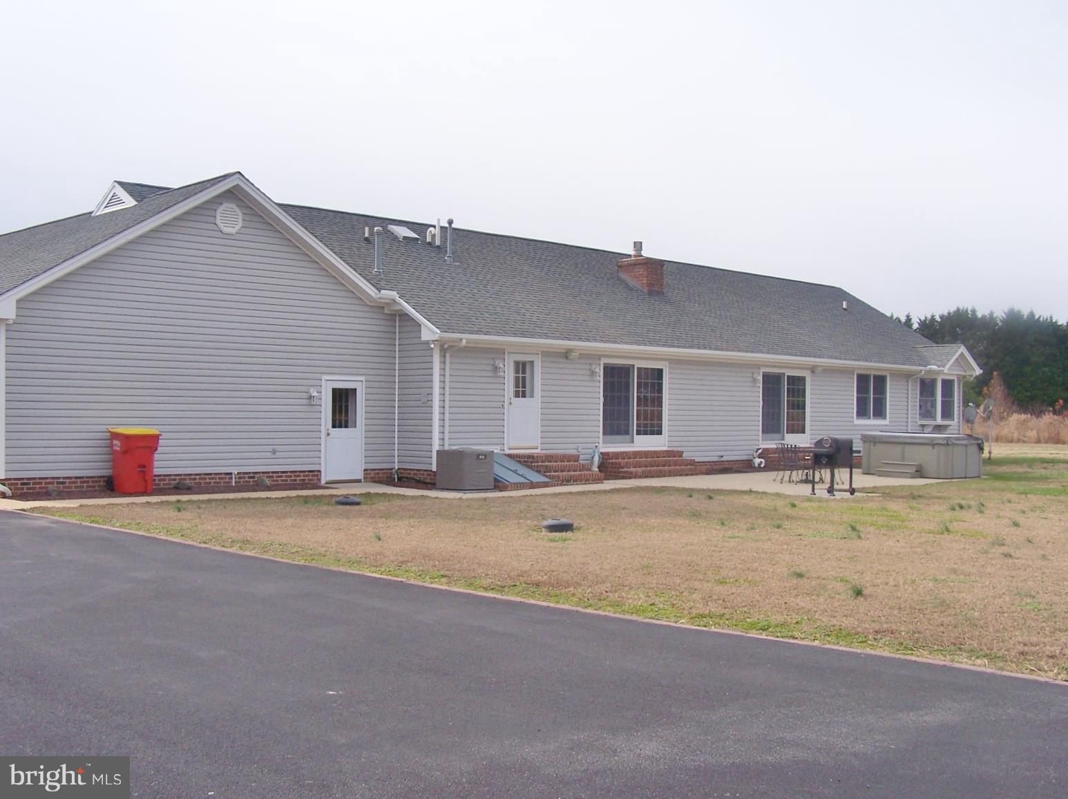 2395 McDowell Road Bridgeville, DE 19933 - Photo 65 of 76 Rear view--hard to see patio/6 person hot tub.