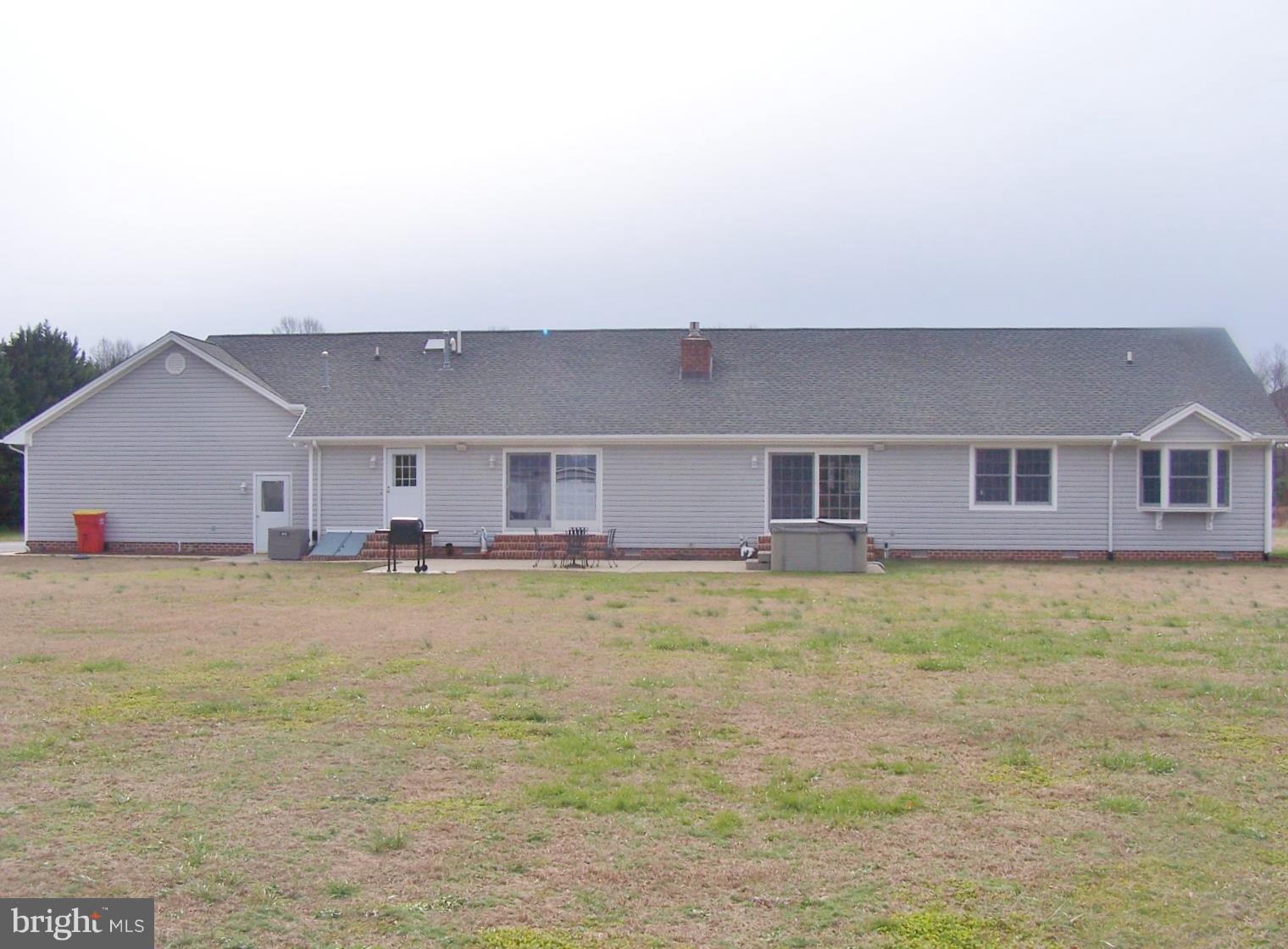 2395 McDowell Road Bridgeville, DE 19933 - Photo 67 of 76 A little peek of the patio and hot tub.