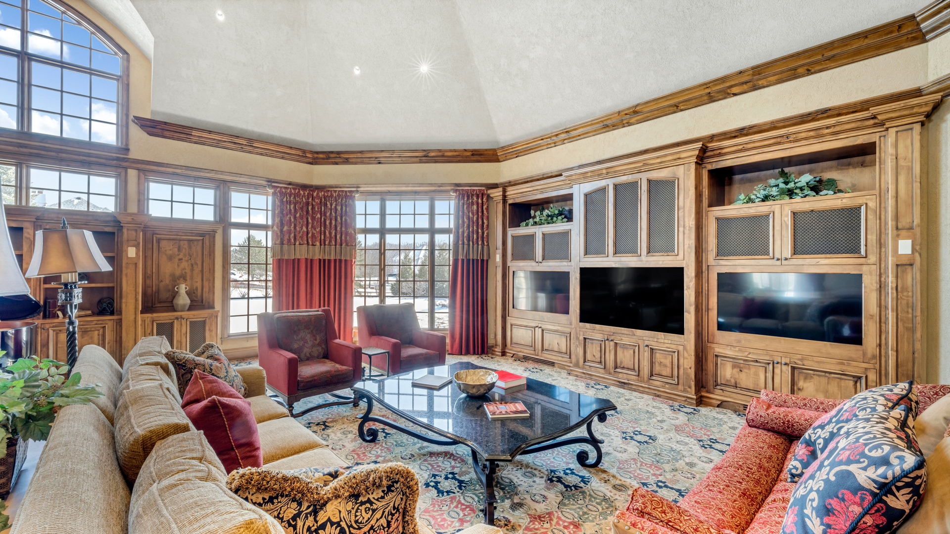 137 Singletree Road Orland Park, IL 60467 - Photo 22 of 75 a living room with furniture and a flat screen tv