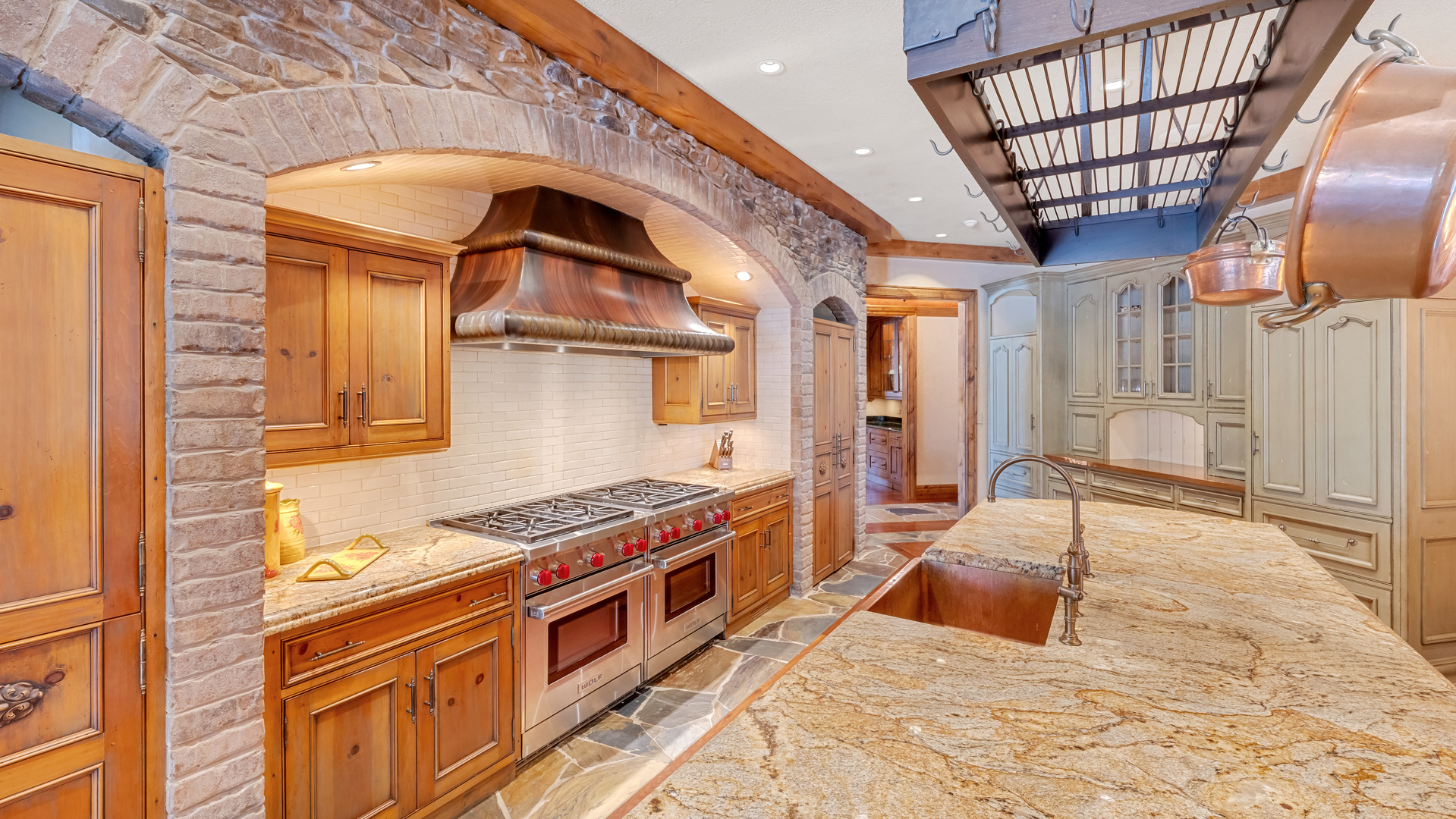 137 Singletree Road Orland Park, IL 60467 - Photo 27 of 75 a kitchen with stainless steel appliances granite countertop a stove a sink and a refrigerator