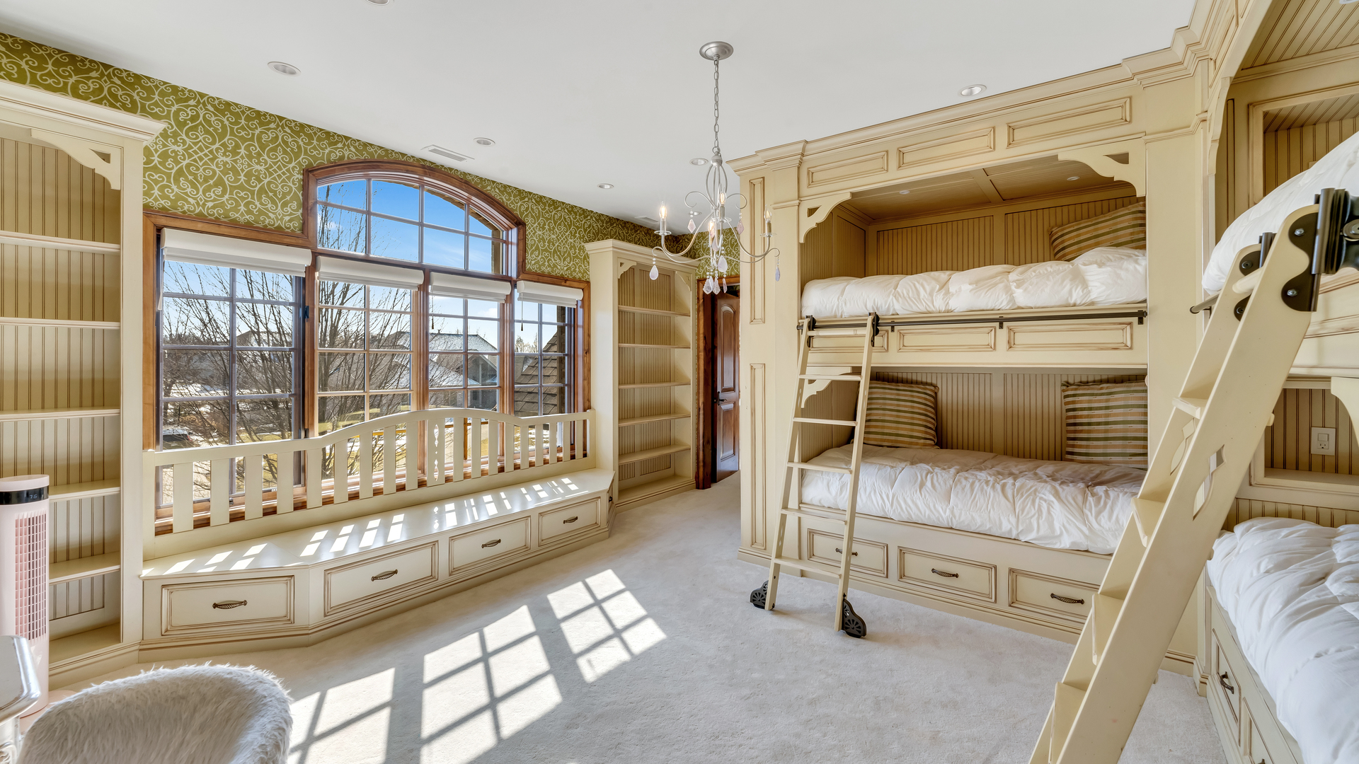 137 Singletree Road Orland Park, IL 60467 - Photo 34 of 75 a view of walk in closet with window and chandelier