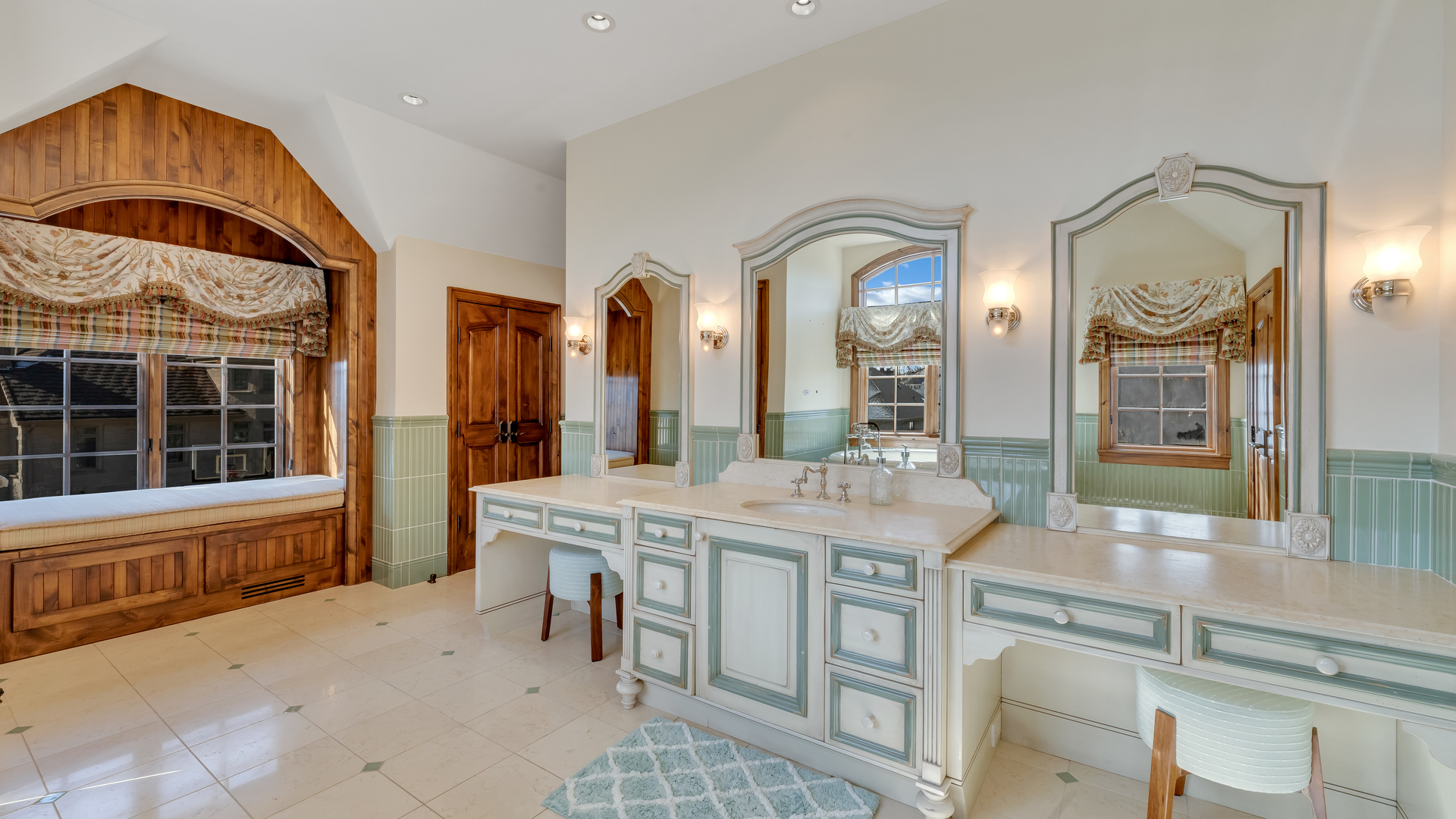 137 Singletree Road Orland Park, IL 60467 - Photo 36 of 75 a spacious bathroom with a granite countertop tub and a large mirror