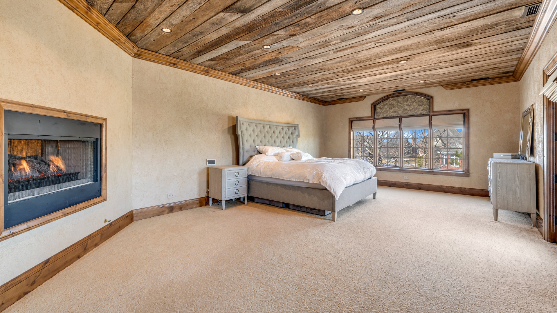 137 Singletree Road Orland Park, IL 60467 - Photo 42 of 75 a spacious bedroom with a bed and a mirror