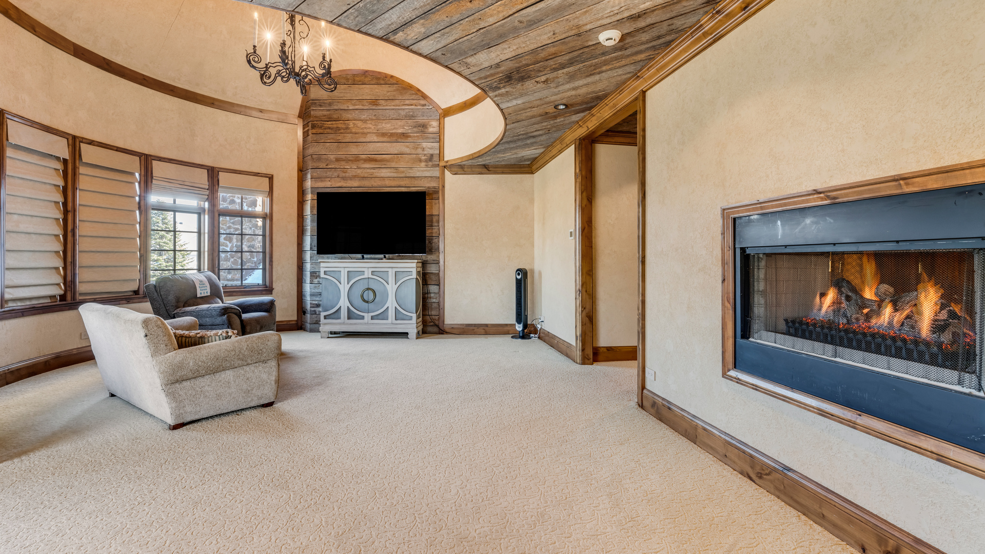 137 Singletree Road Orland Park, IL 60467 - Photo 43 of 75 a living room with furniture and a flat screen tv