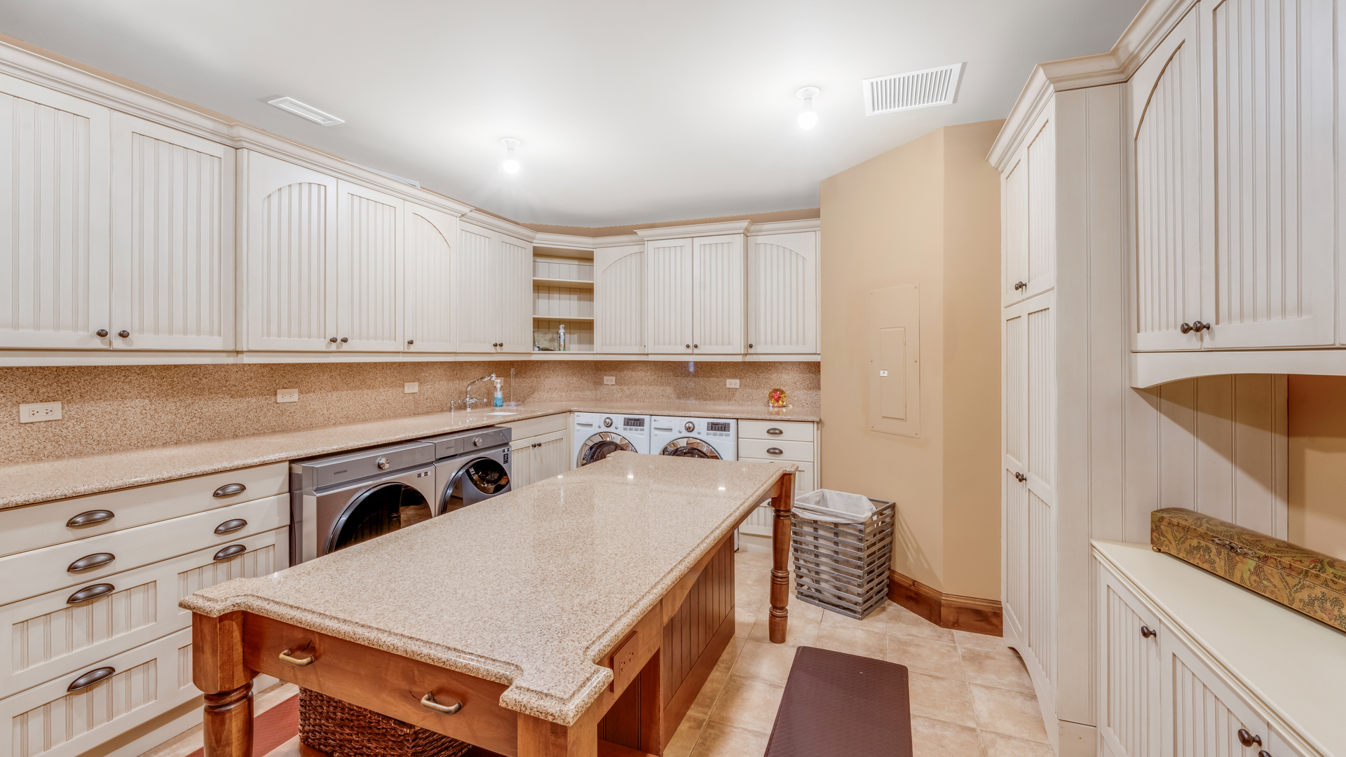 137 Singletree Road Orland Park, IL 60467 - Photo 47 of 75 a kitchen with stainless steel appliances a stove a sink and white cabinets