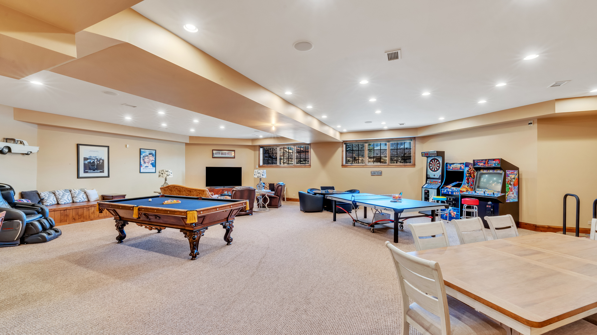 137 Singletree Road Orland Park, IL 60467 - Photo 50 of 75 a living room with furniture and a flat screen tv