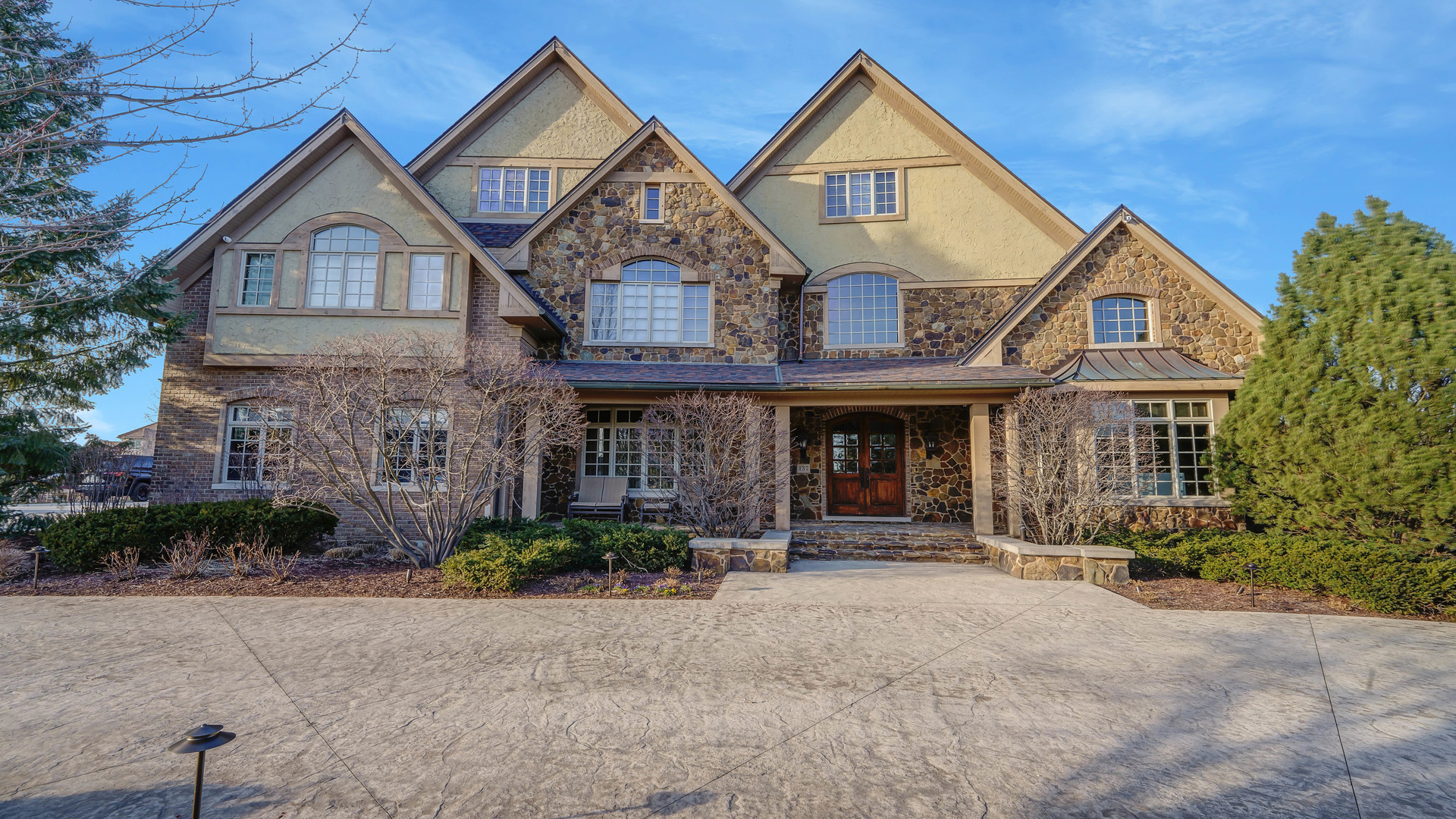 137 Singletree Road Orland Park, IL 60467 - Photo 74 of 75 a front view of a house with a yard and garage