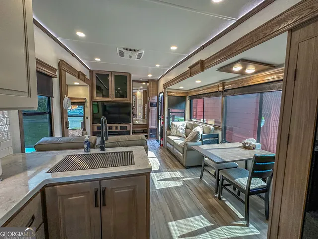 a kitchen with a stove and a microwave