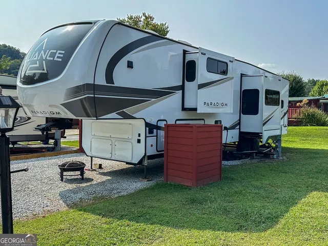 a view of swimming pool with a yard