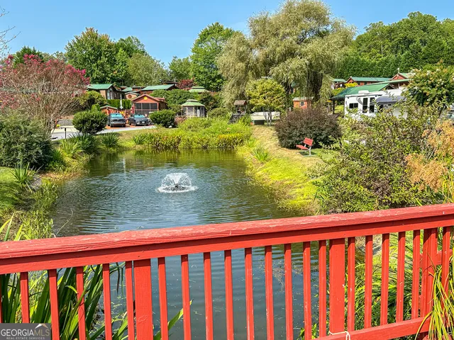 a view of swimming pool from a balcony