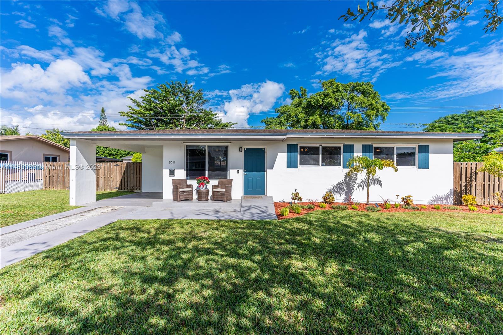 9511 Holiday Road Cutler Bay, FL 33157 - Photo 1 of 19 front view of a house with a patio