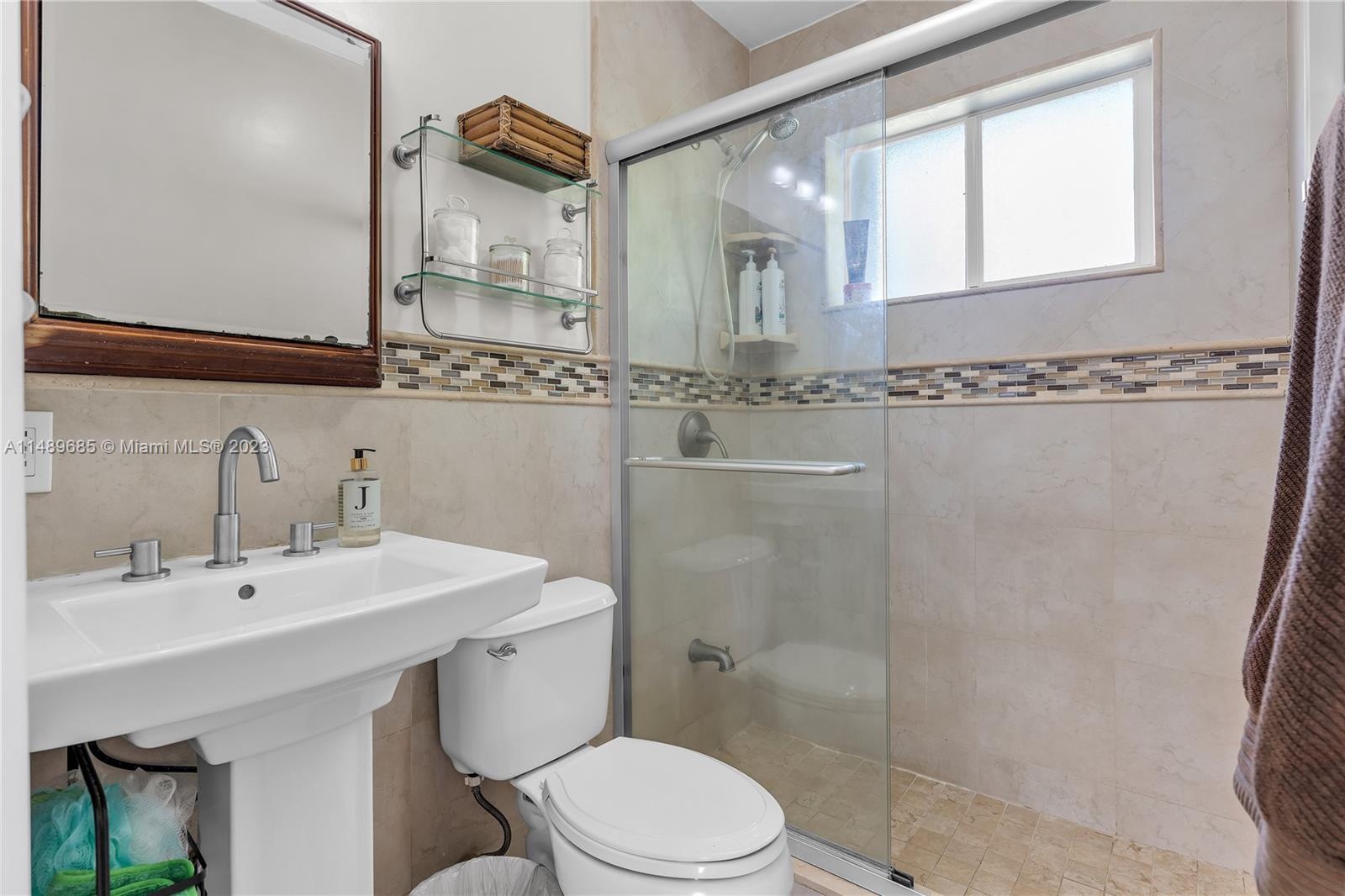 9511 Holiday Road Cutler Bay, FL 33157 - Photo 16 of 19 a bathroom with a sink a toilet and shower