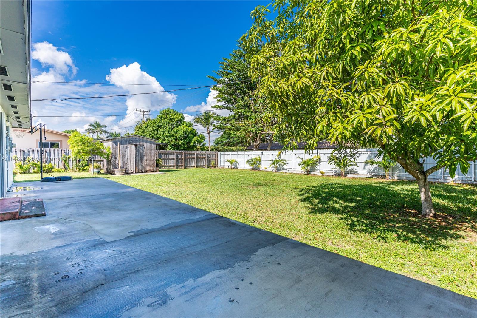 9511 Holiday Road Cutler Bay, FL 33157 - Photo 17 of 19 a view of a house with a yard