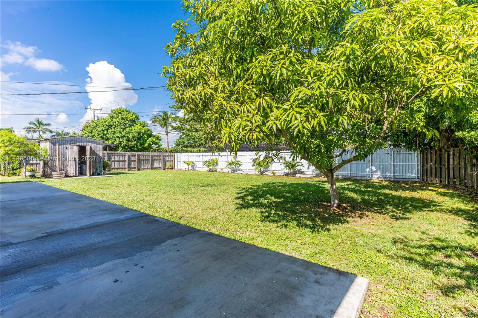 9511 Holiday Road Cutler Bay, FL 33157 - Photo 18 of 19 a view of a yard with an trees