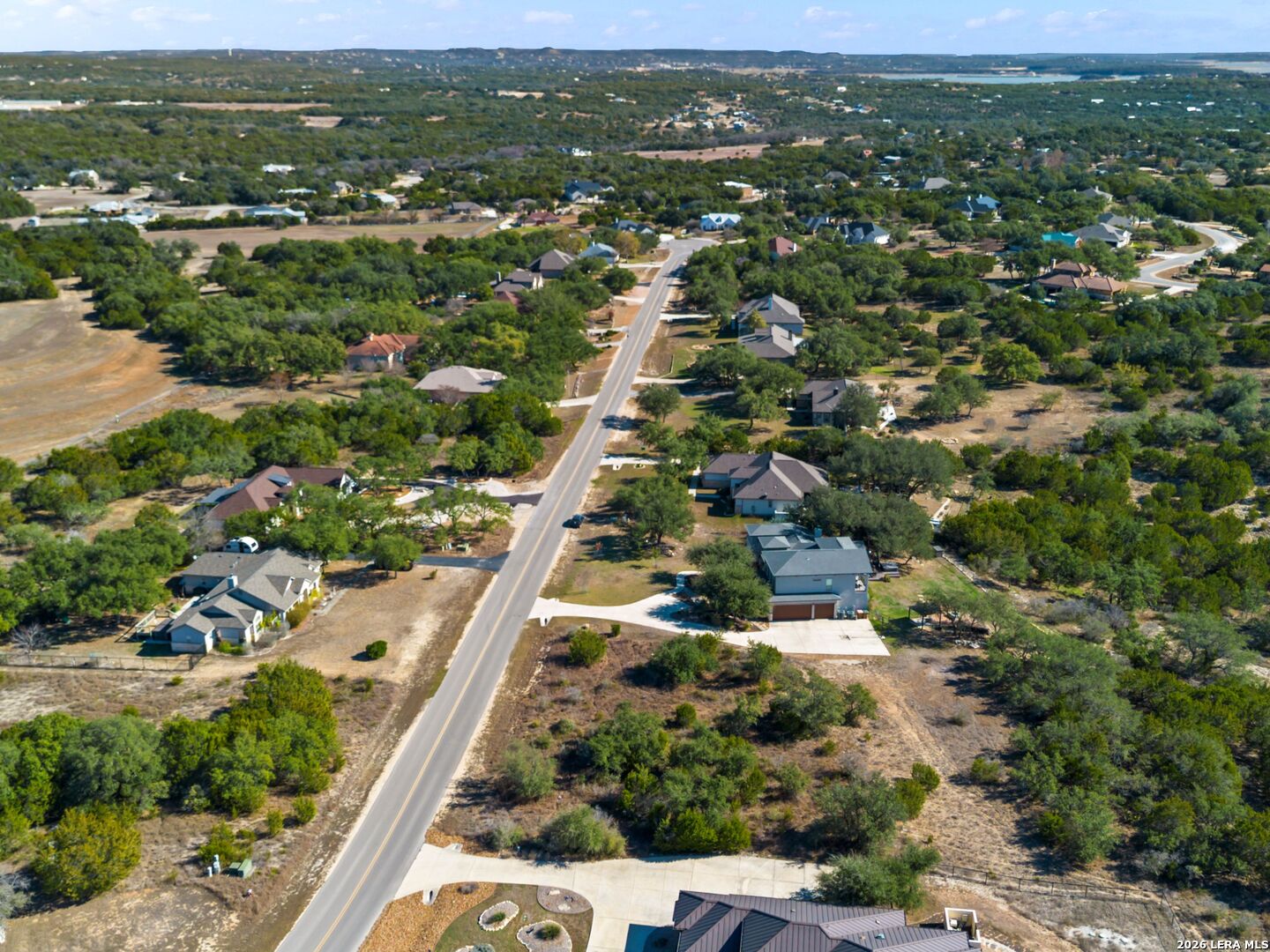 344 Quest Spring Branch, TX 78070 - Photo 15 of 16 an aerial view of residential houses with outdoor space and trees