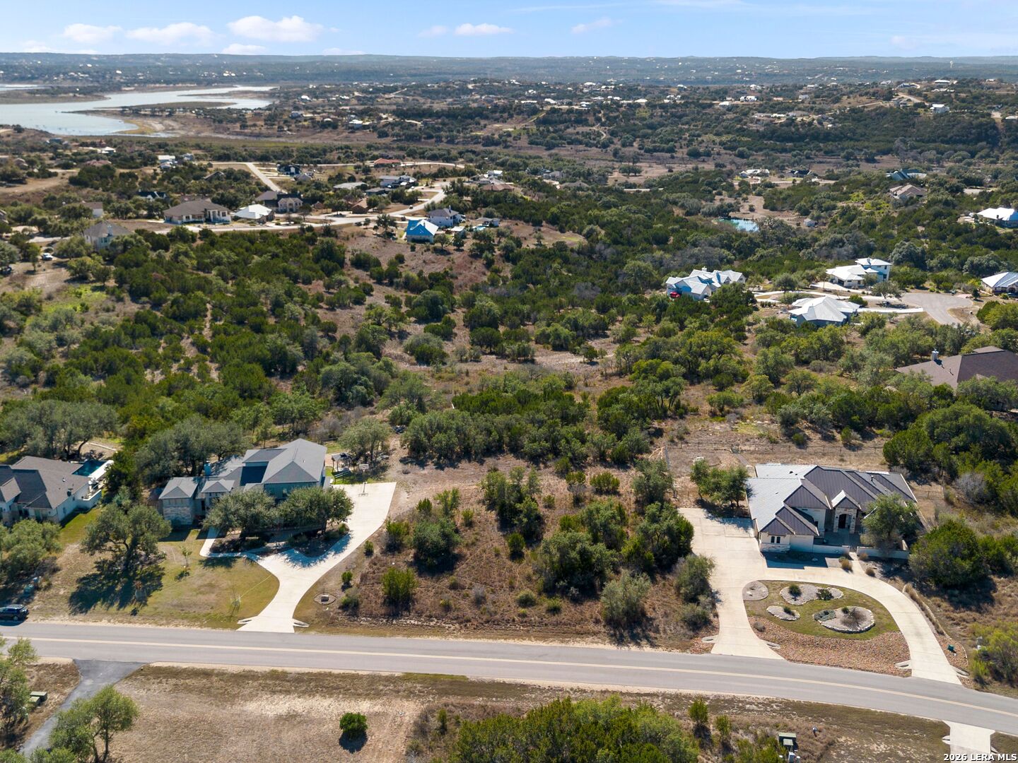344 Quest Spring Branch, TX 78070 - Photo 7 of 16 an aerial view of residential houses with city view