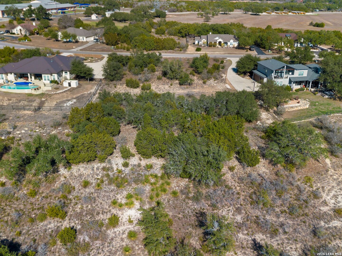 344 Quest Spring Branch, TX 78070 - Photo 10 of 16 an aerial view of residential houses with outdoor space