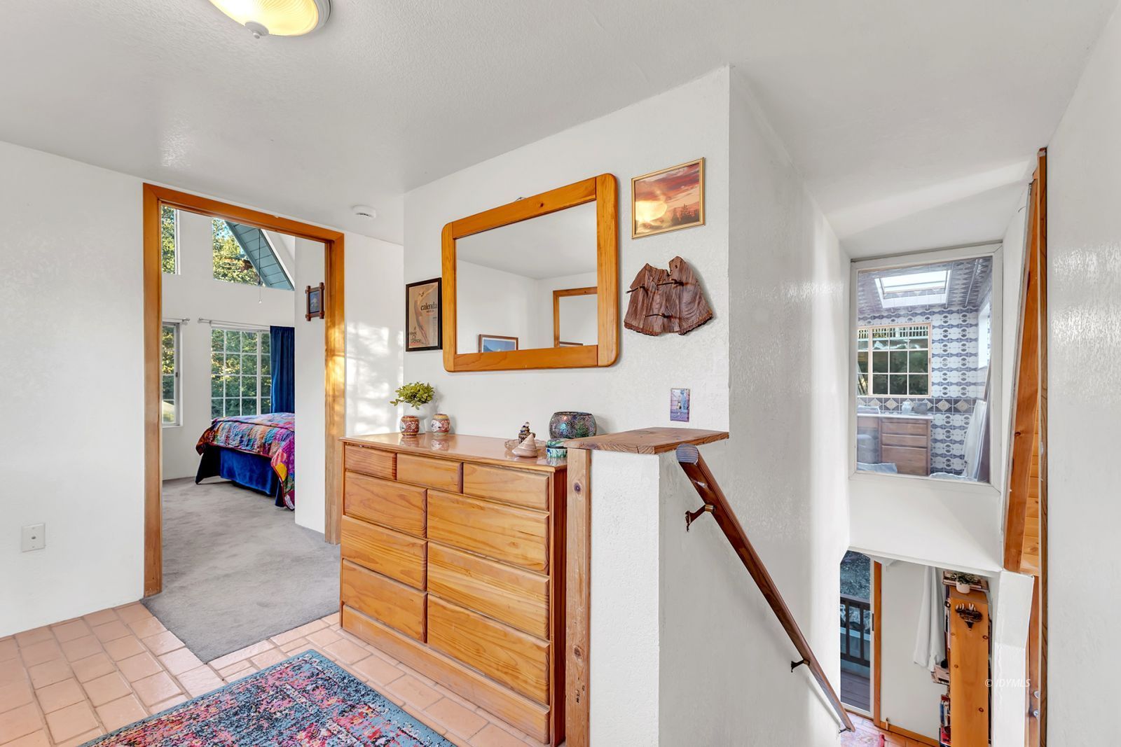 26750 Saunders Meadow Road Idyllwild, CA 92549 - Photo 28 of 56 a bed room with furniture and a window