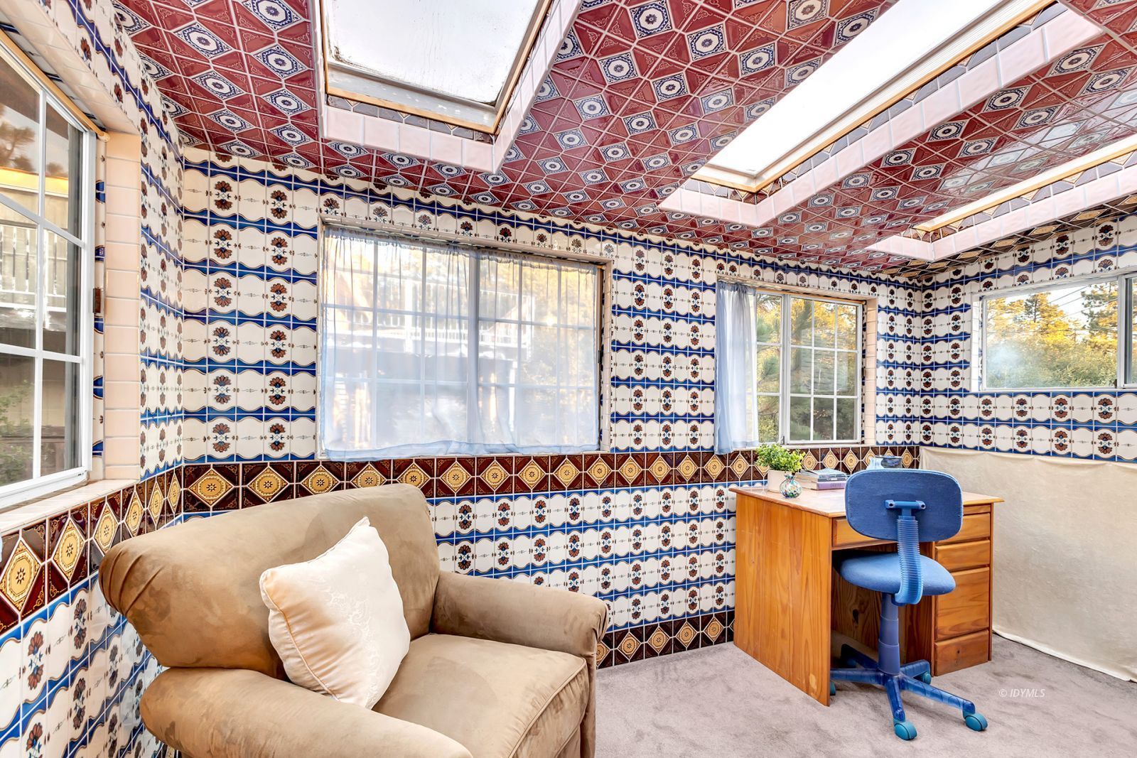 26750 Saunders Meadow Road Idyllwild, CA 92549 - Photo 32 of 56 a living room with furniture windows and a flat screen tv