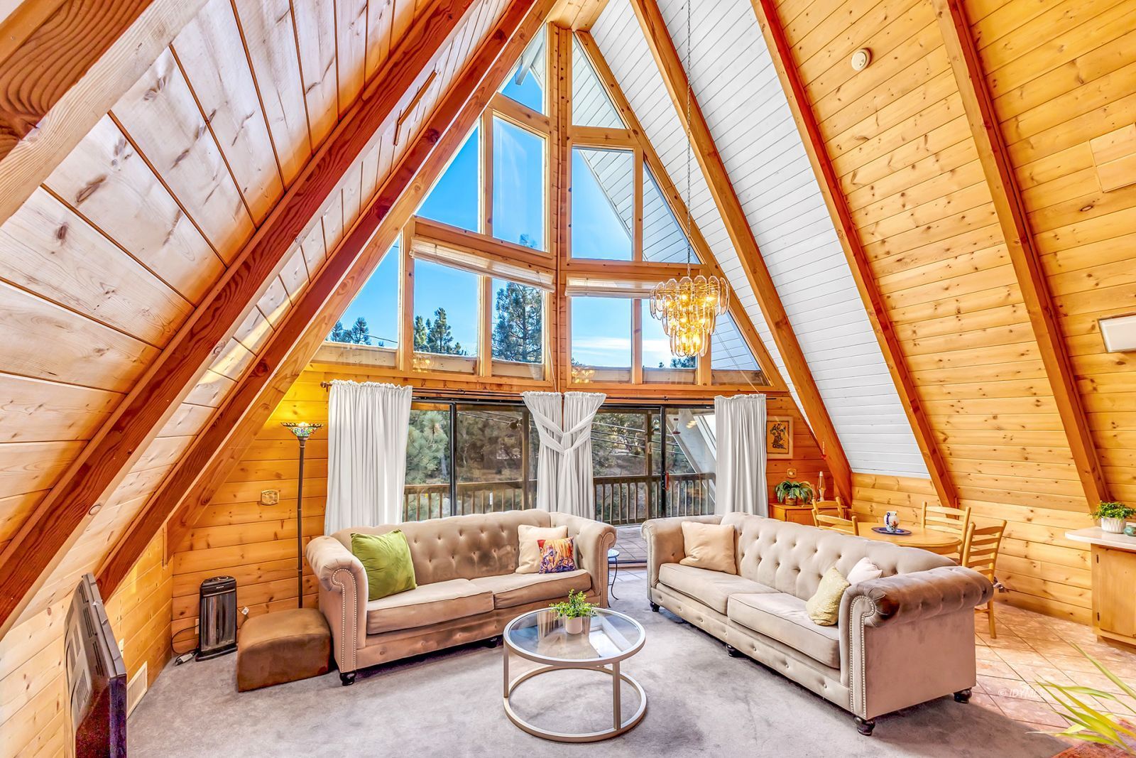 26750 Saunders Meadow Road Idyllwild, CA 92549 - Photo 6 of 56 a living room with furniture and a large window