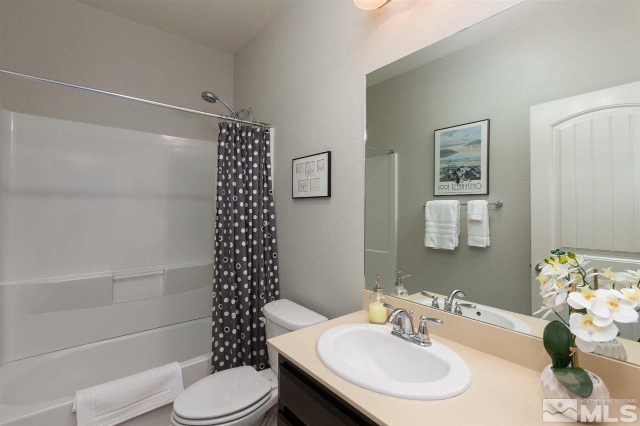 1830 Cascade Stable Lane Reno, NV 89521 - Photo 17 of 25 a bathroom with a sink toilet and shower
