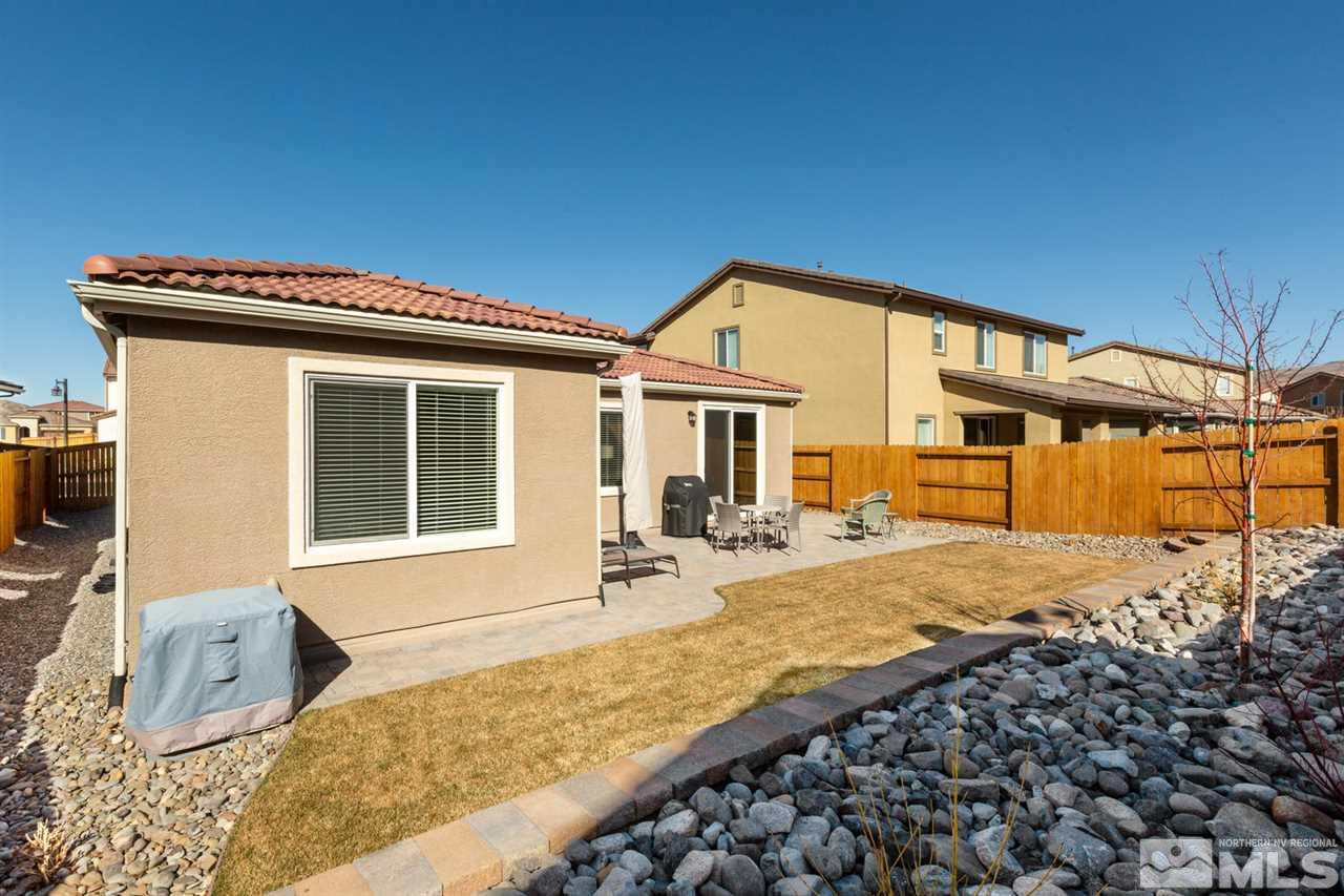 1830 Cascade Stable Lane Reno, NV 89521 - Photo 20 of 25 a front view of a house with a yard