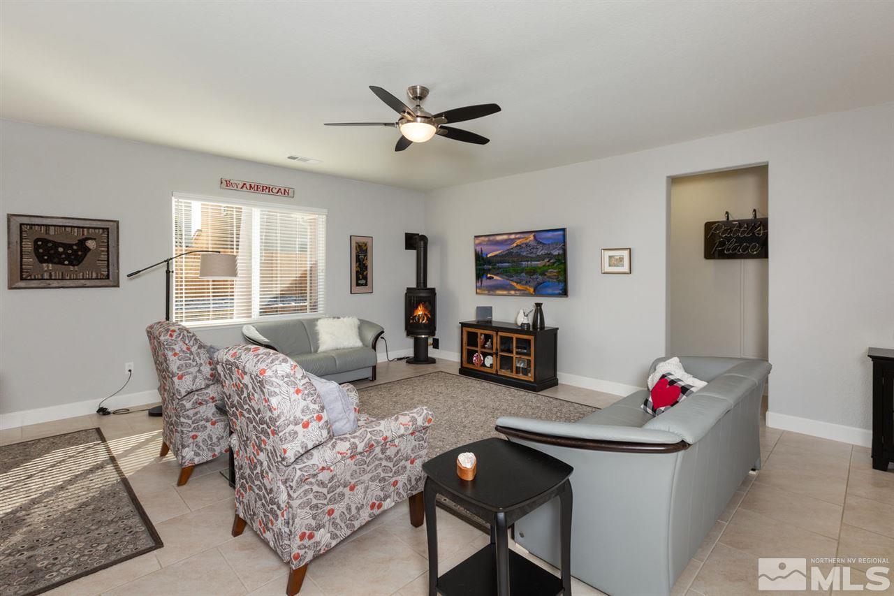 1830 Cascade Stable Lane Reno, NV 89521 - Photo 2 of 25 a living room with furniture chess board and a window