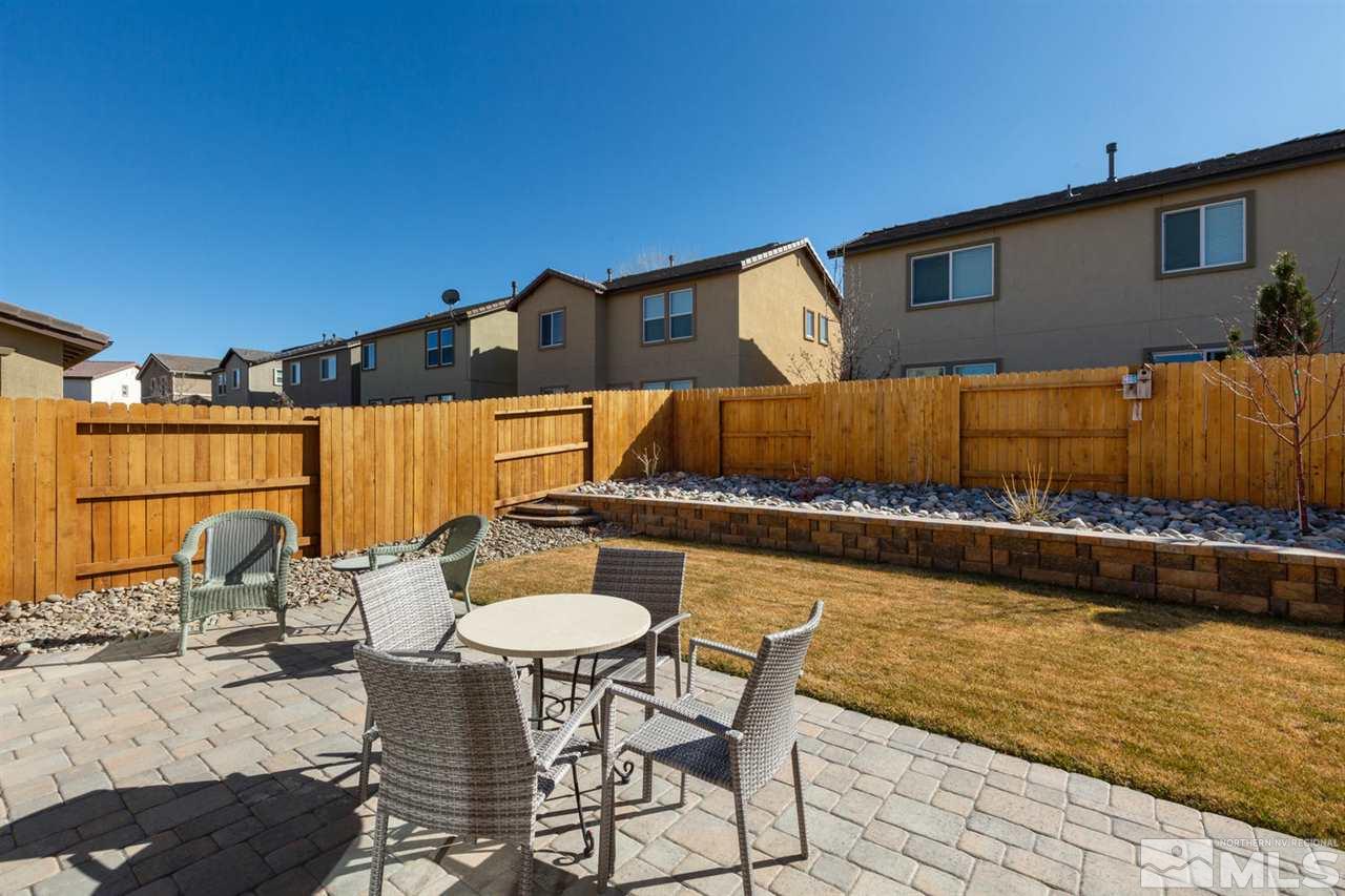 1830 Cascade Stable Lane Reno, NV 89521 - Photo 22 of 25 a view of a chairs and table on the terrace