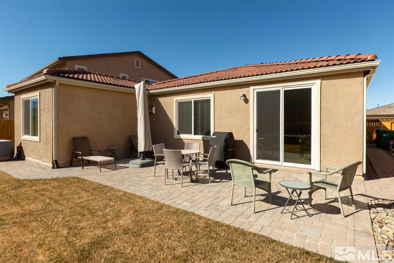 1830 Cascade Stable Lane Reno, NV 89521 - Photo 23 of 25 a view of a dinning table and chairs in the patio