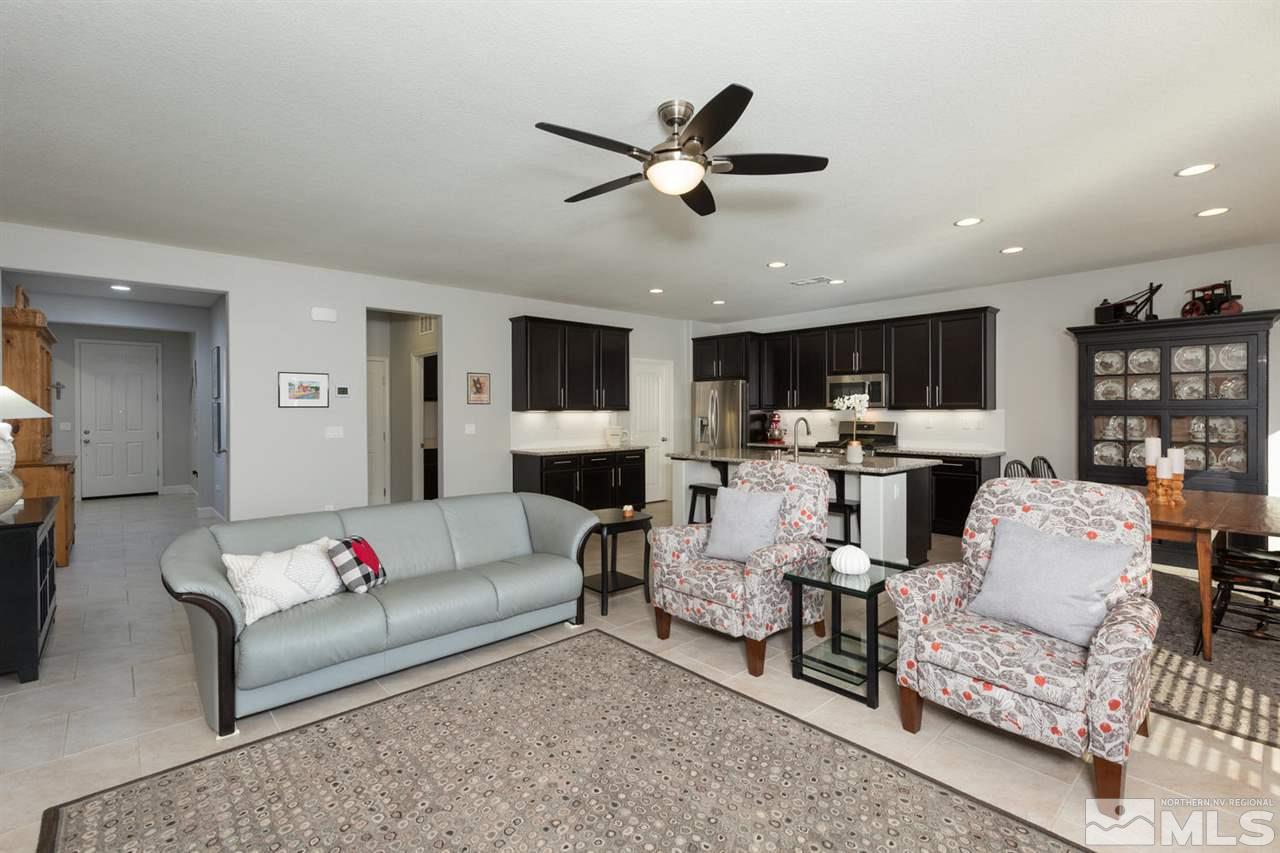 1830 Cascade Stable Lane Reno, NV 89521 - Photo 4 of 25 a living room with furniture kitchen view and a chandelier