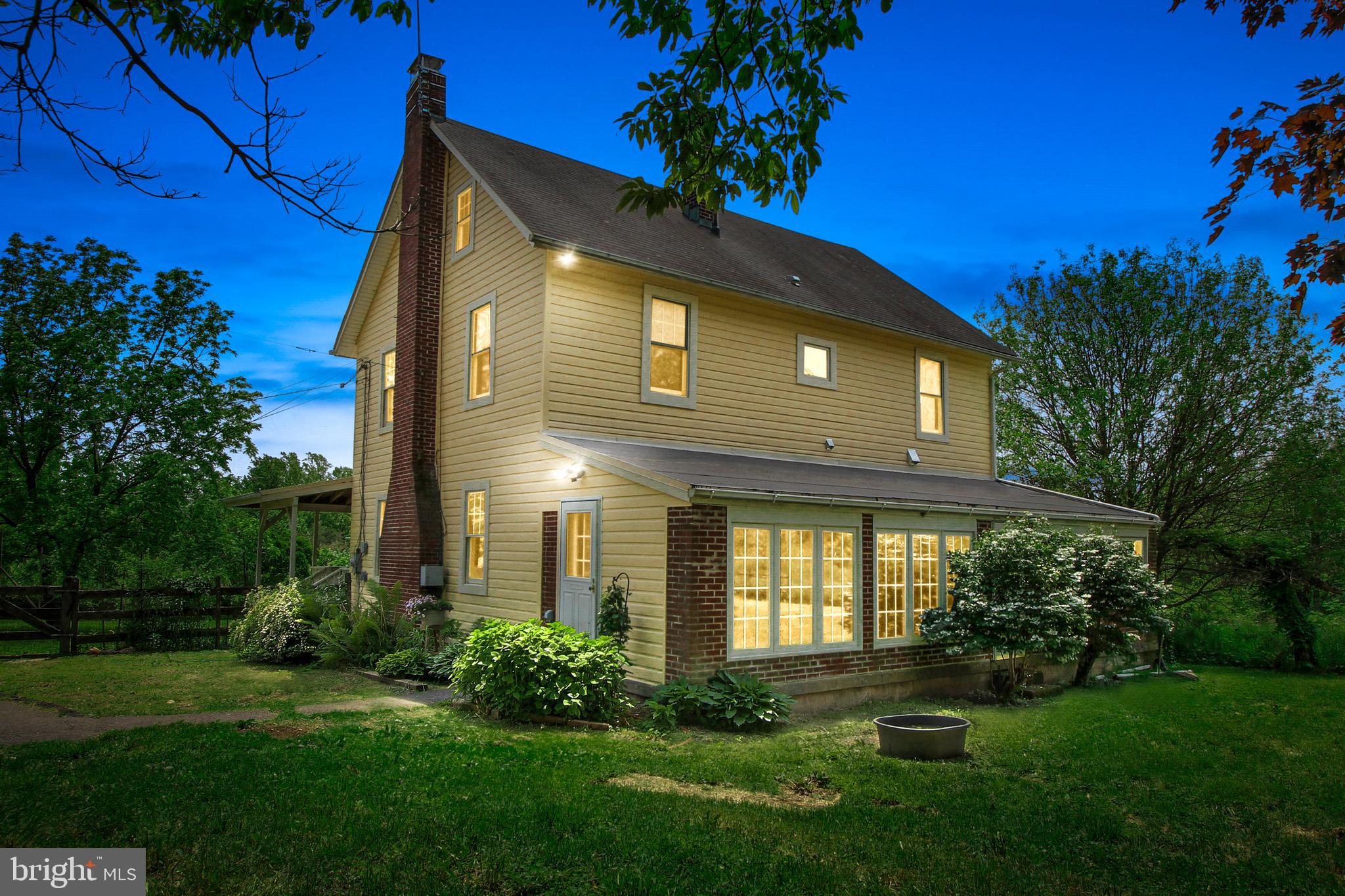 1075 Ebert Road Coopersburg, PA 18036 - Photo 1 of 36 House at dusk