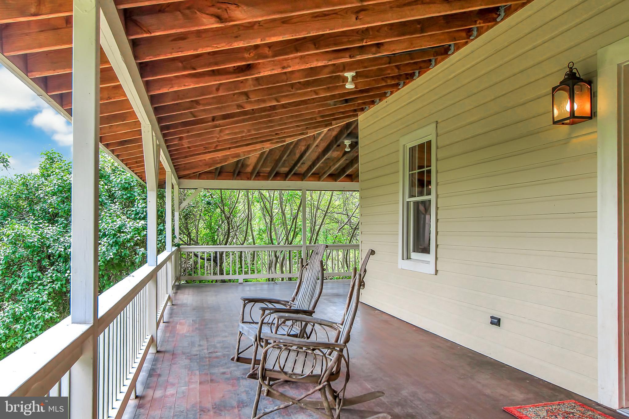 1075 Ebert Road Coopersburg, PA 18036 - Photo 18 of 36 Wrap-around mahogany porch