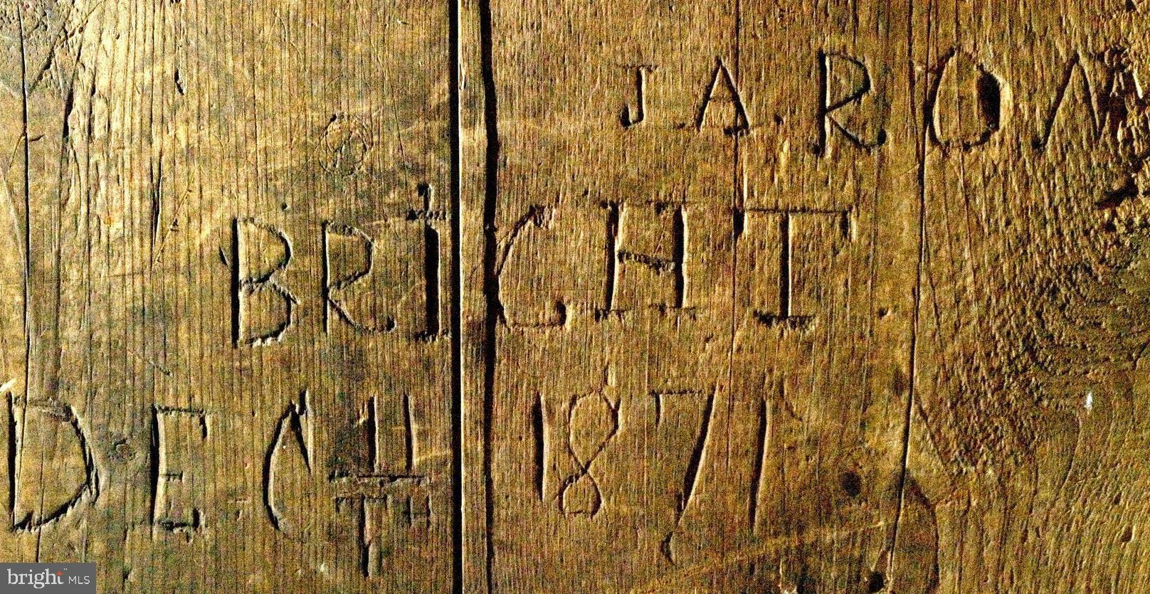 1075 Ebert Road Coopersburg, PA 18036 - Photo 31 of 36 Carving in barn, 1871