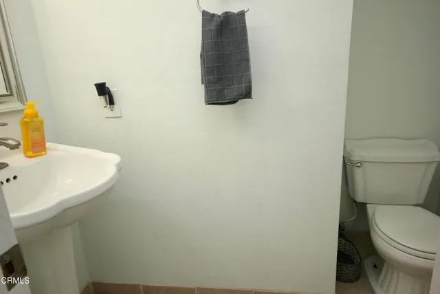 a bathroom with a sink and a toilet